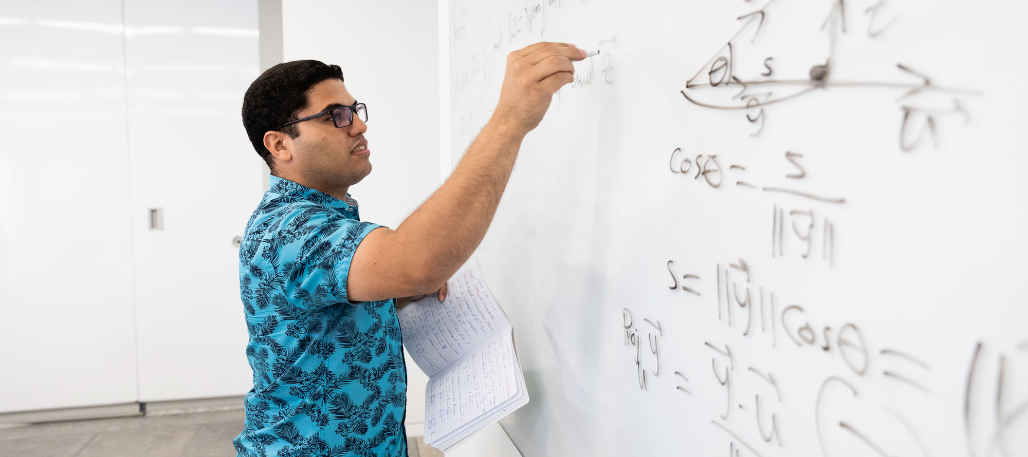 students measuring in lab