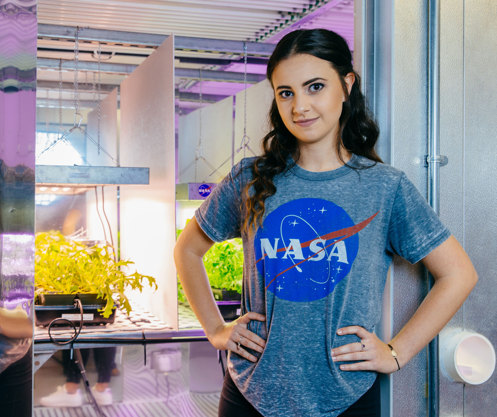 Female in NASA t-shirt.