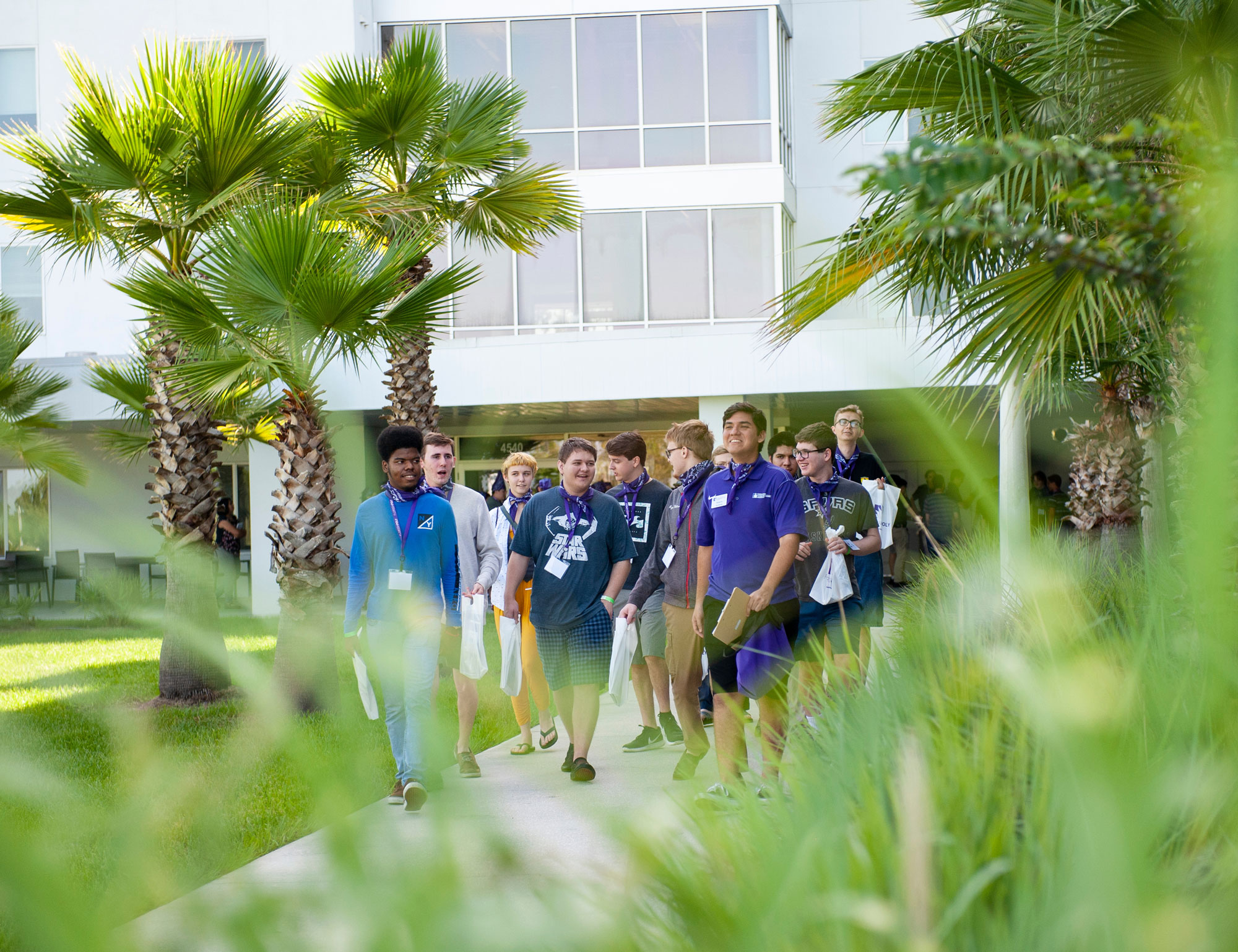 Group of students walking around campus.