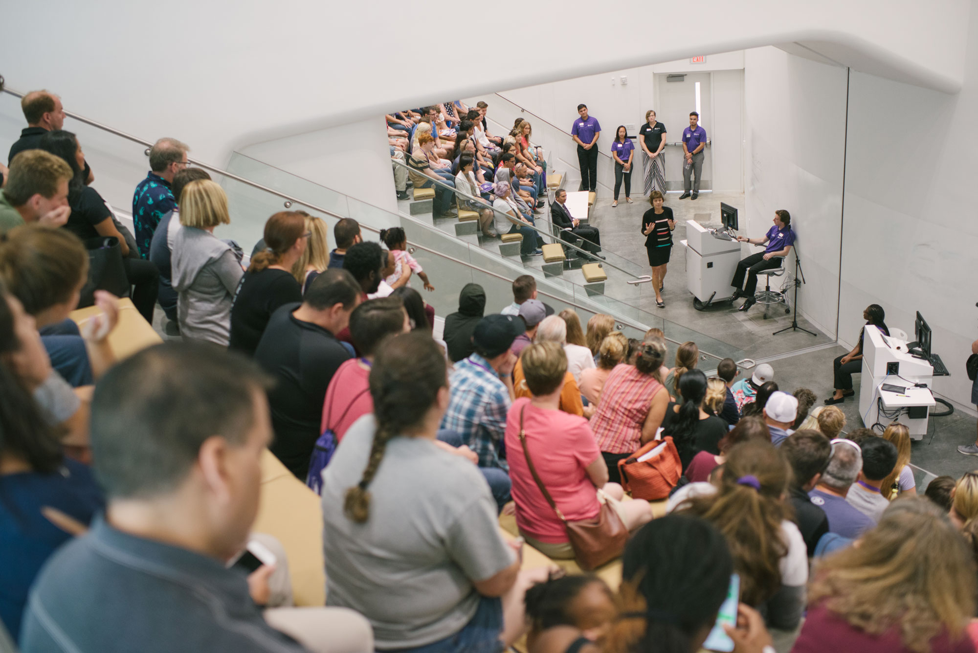 Visitors in a presentation hall.