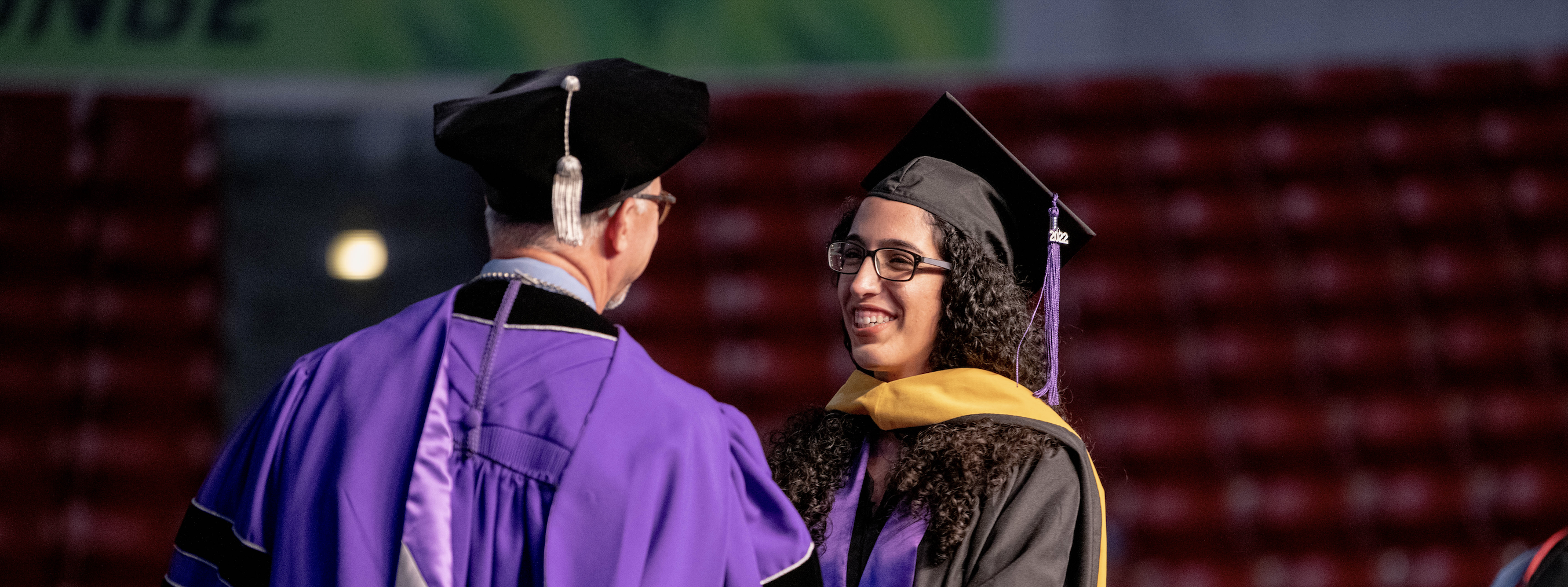 girl smiling at graduation