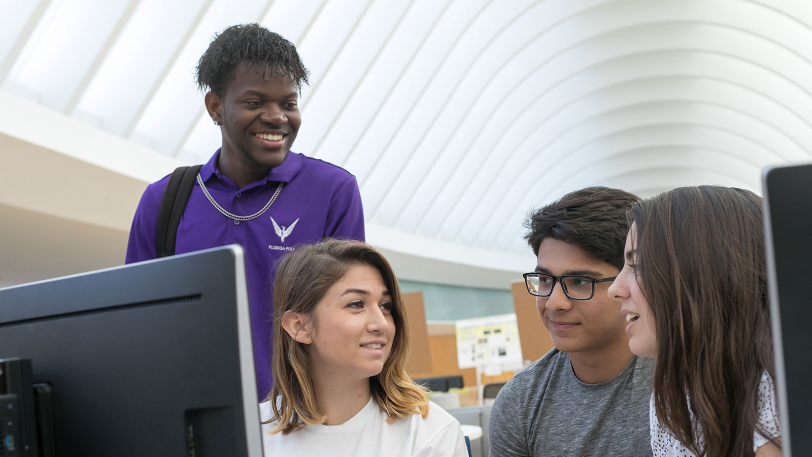 students working on computer