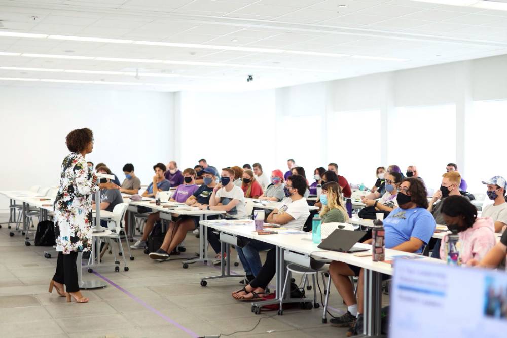 Dr. Lynn Johnson, owner and senior consultant at Triumphant HR Solutions, speaks to Florida Polytechnic University student leaders during U Lead. 