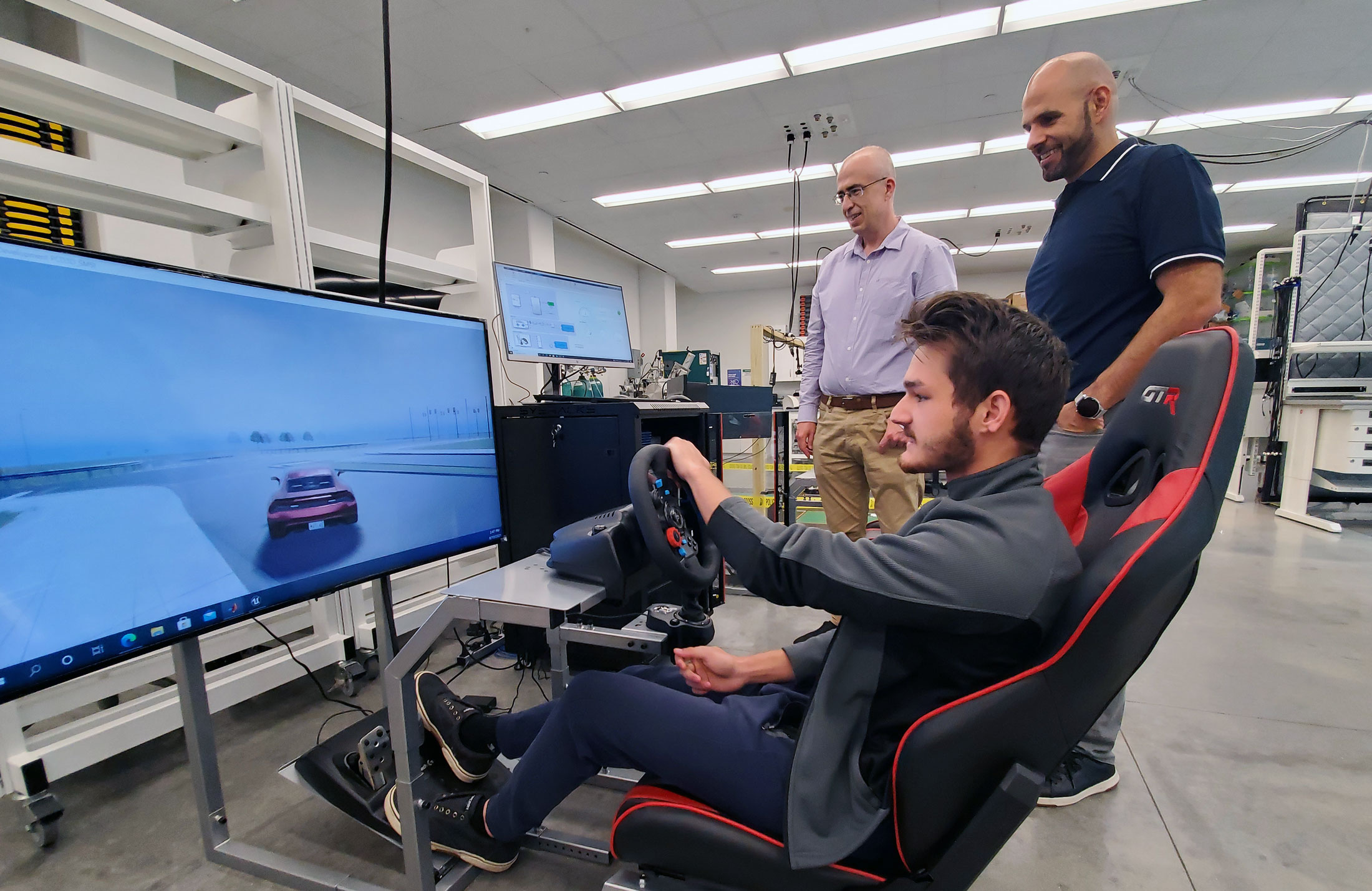 Shane Holmes uses autonomous vehicle testing equipment.