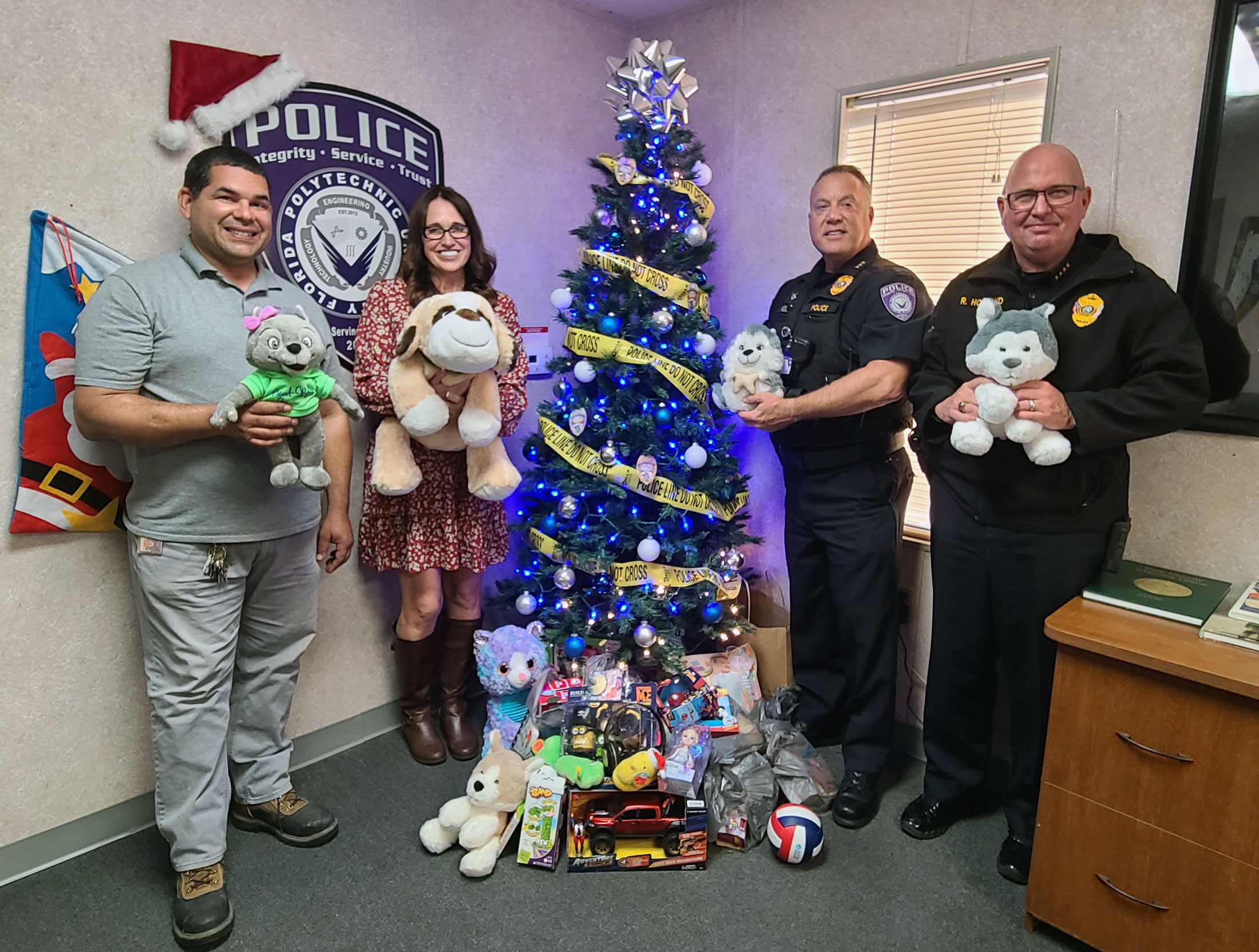 Toys donated to the annual holiday toy drive are shown off