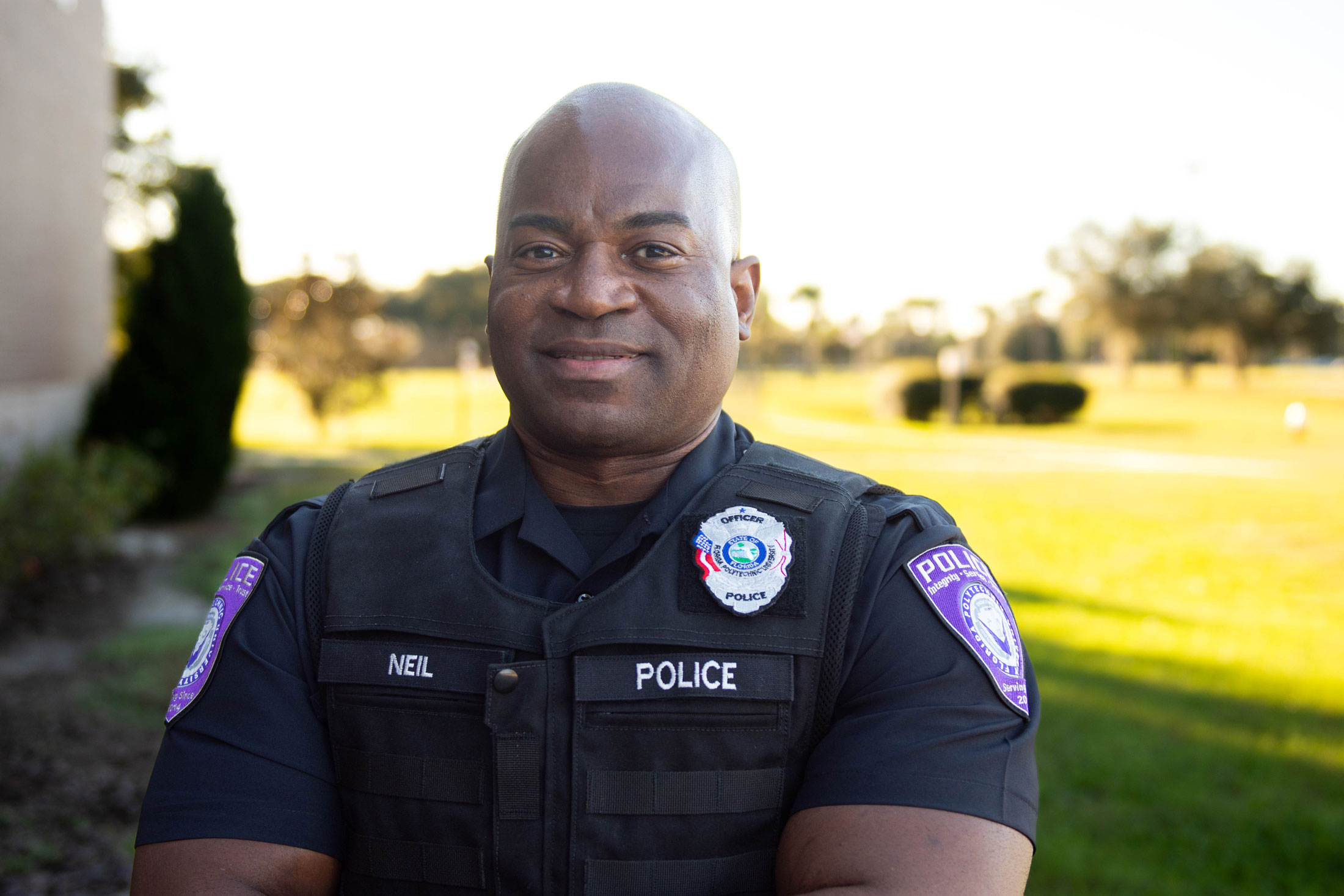 Positivity and commitment to service drive Florida Poly police officer