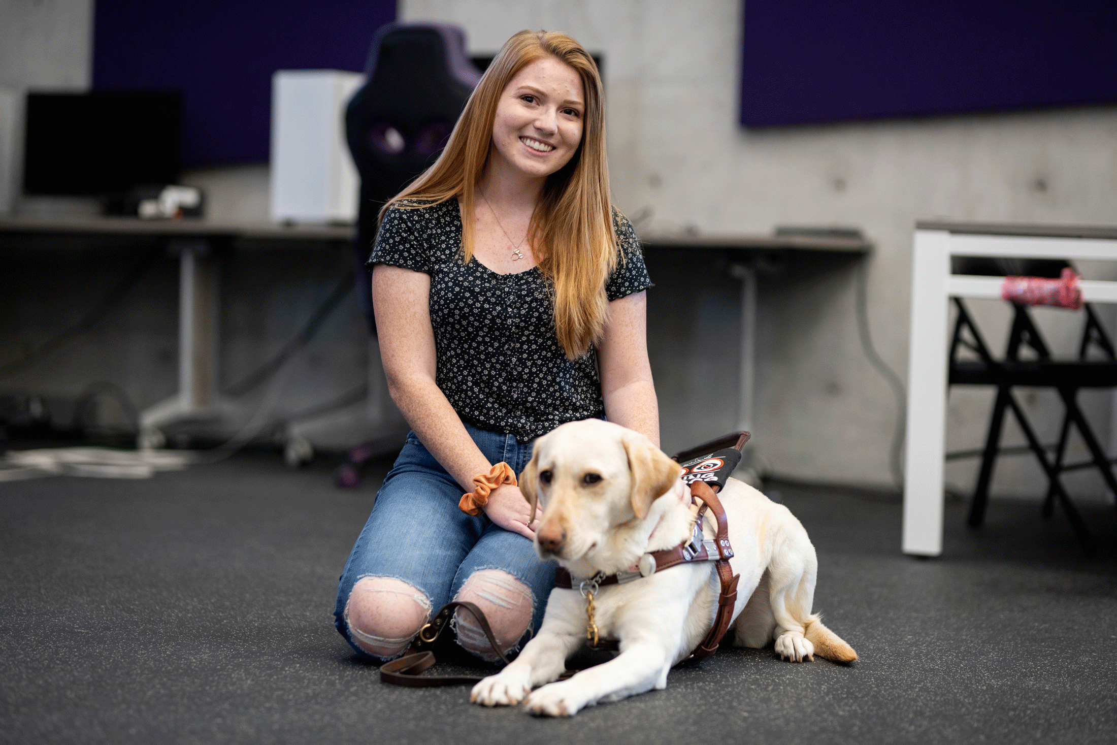 Hailey Skoglund and her service dog, Marli.