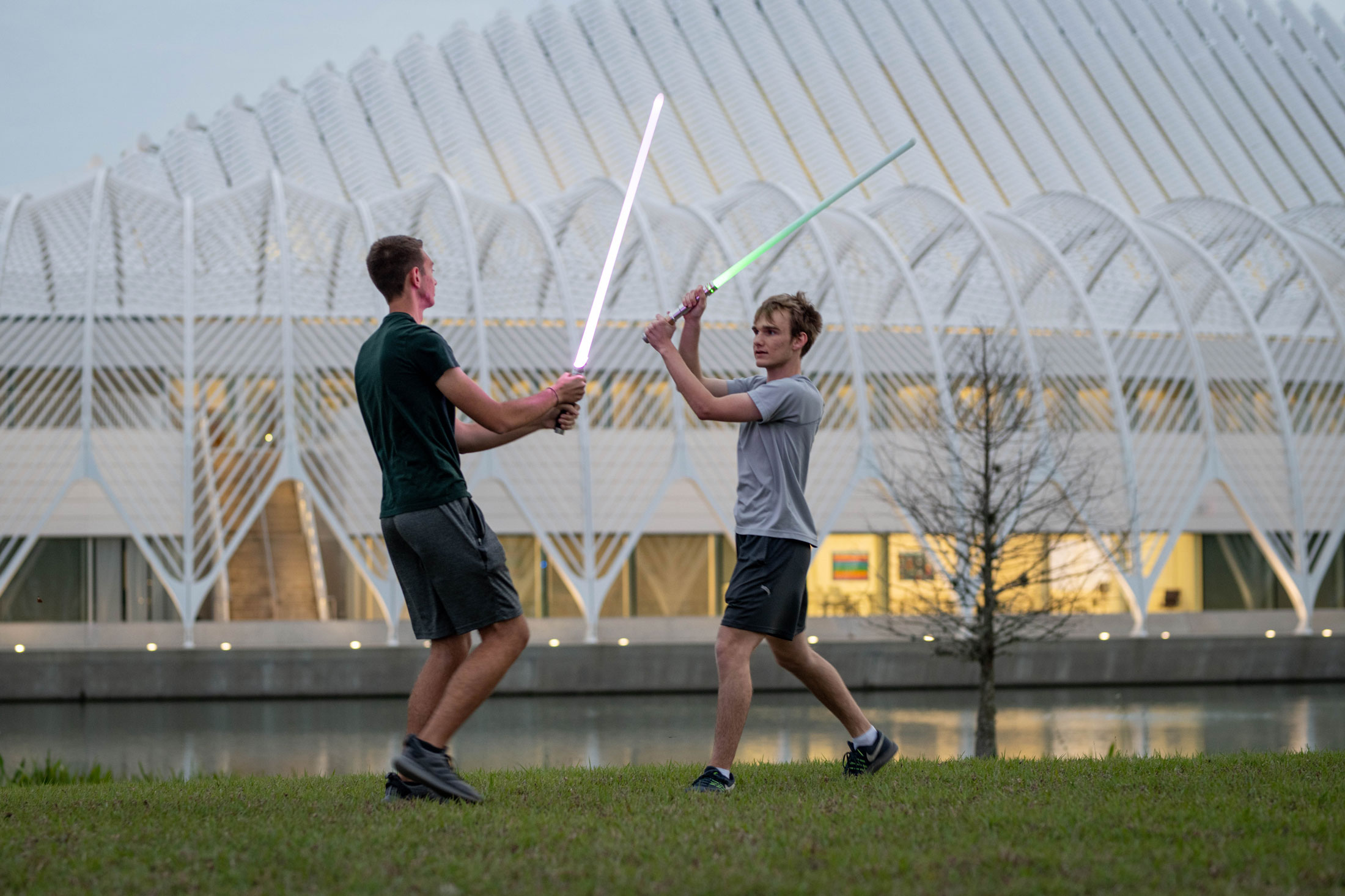 Members of the Force Institute train with lightsabers.