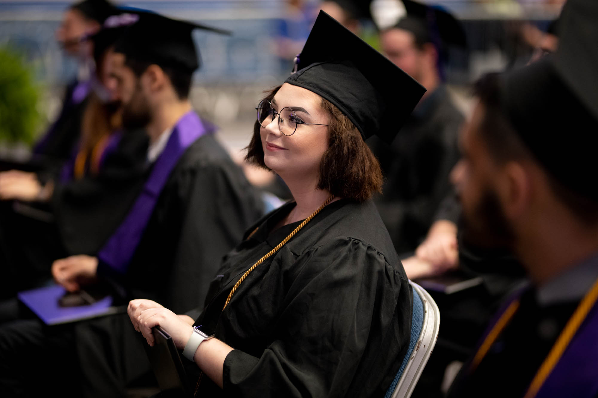 Nicole Ely attends the 2022 Florida Polytechnic University commencement ceremony.