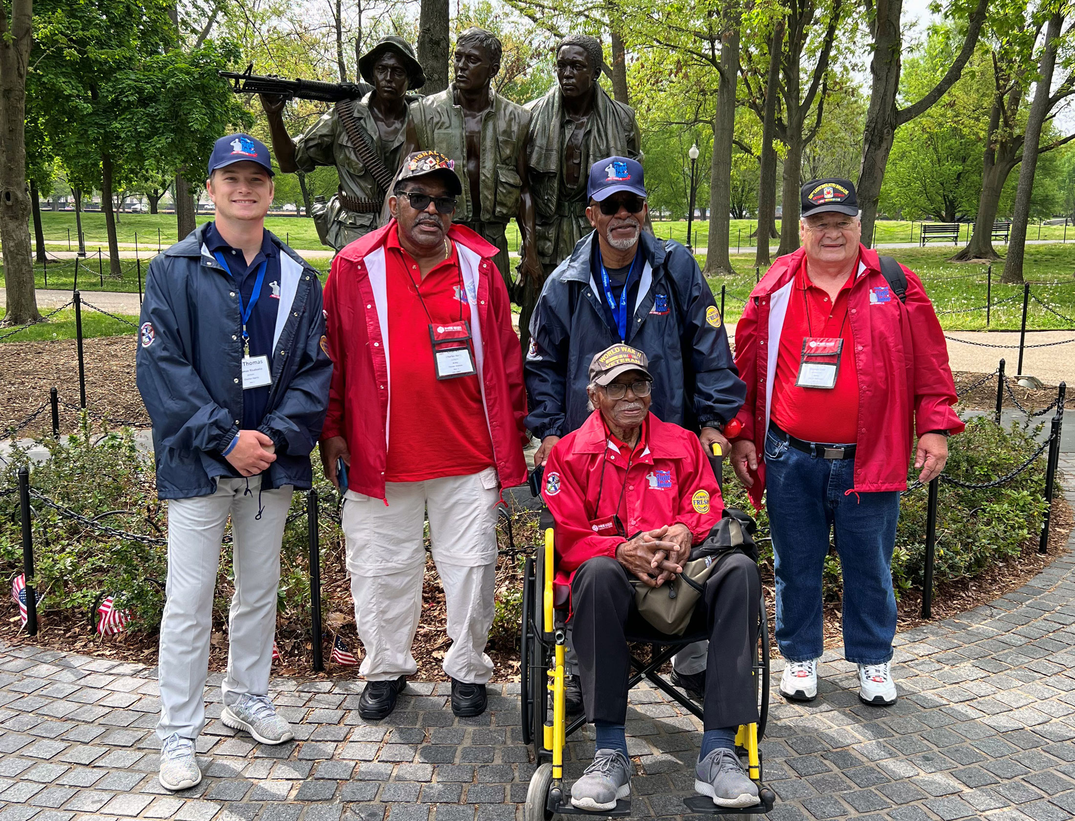 Thomas Risalvato joins a group of veterans at the Three Soldiers Statue at the Vietnam Veterans Memorial in Washington, D.C.