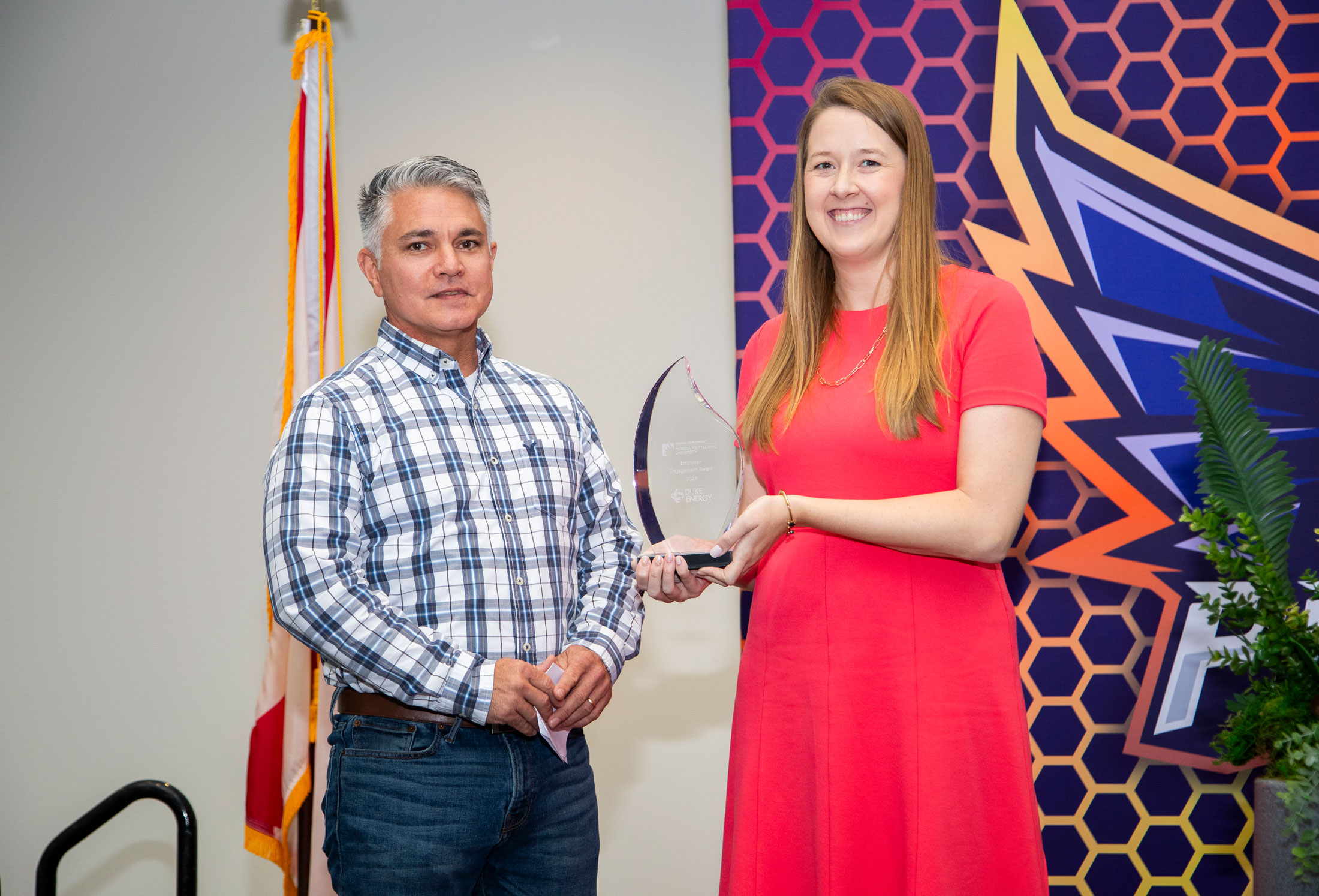 Michael Mathews, engineering manager at Duke Energy Corporation, and Allison Pirpich, Florida Poly's director of career services and professional development