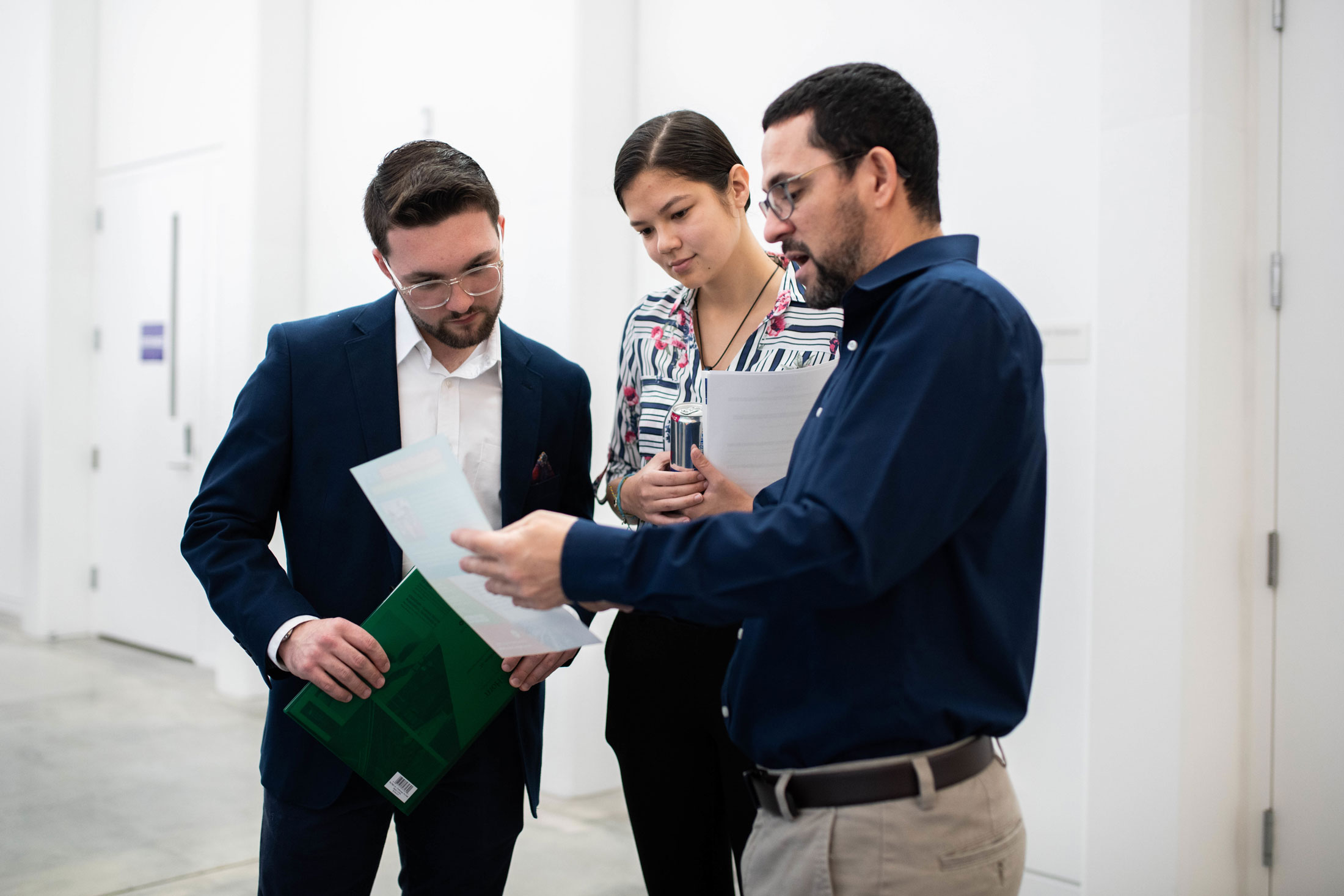 Students talk with a member of industry