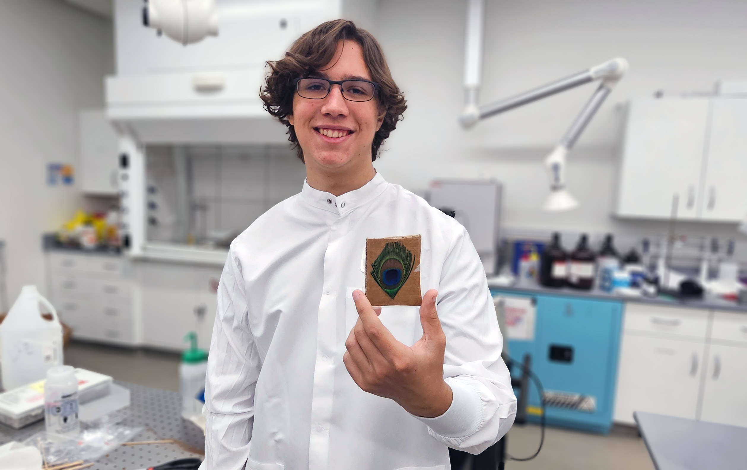 Florida Poly student research uncovers laser light from peacock feathers