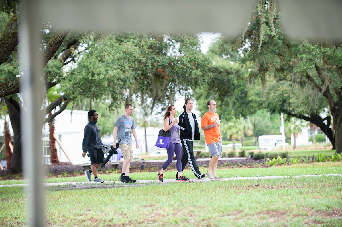 family walking on campus