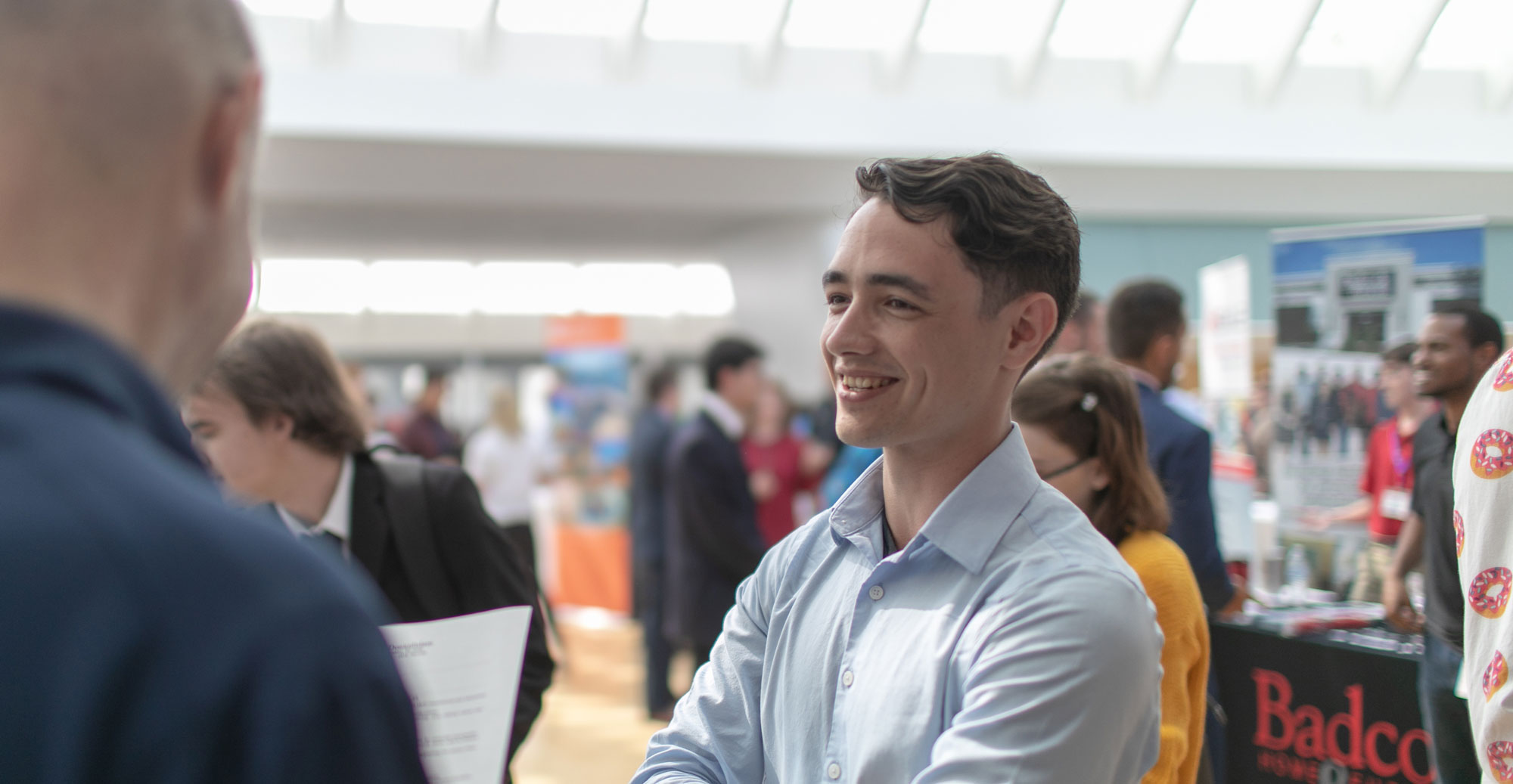 Students at a career fair on campus.