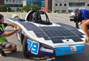 Phoenix Racing, Florida Poly's solar racing team, prepares to continue the cross-country Electrek American Solar Challenge in Tulsa, Oklahoma.