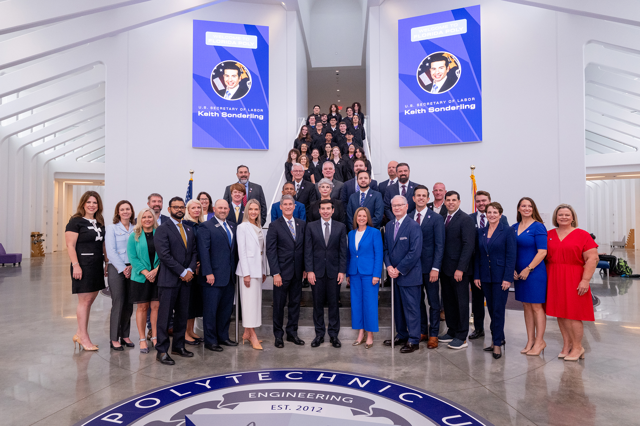 Labor Secretary Keith Sonderling (center) visits Florida Polytechnic University for a roundtable discussion. He is joined by Florida Poly President Dr. Devin Stephenson, two away on his right, and state leadership.