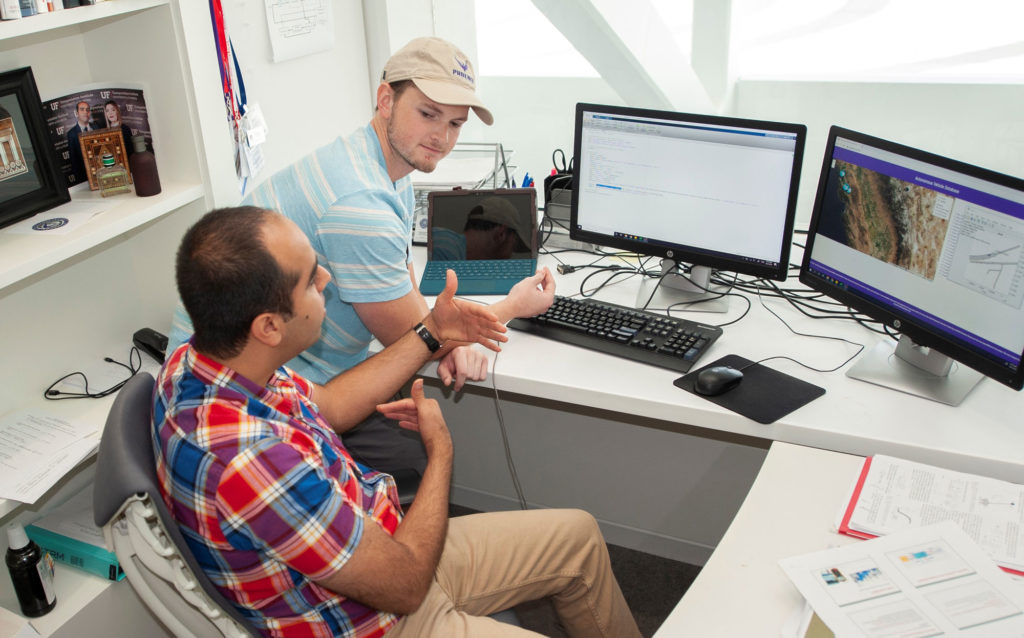 Student research assistant James Holland works with assistant professor of electrical engineering Dr. Arman Sargolzaei on autonomous vehicle technology research. Florida Polytechnic University will have a new simulation facility for real-time testing of this technology, thanks to a new National Science Foundation grant.