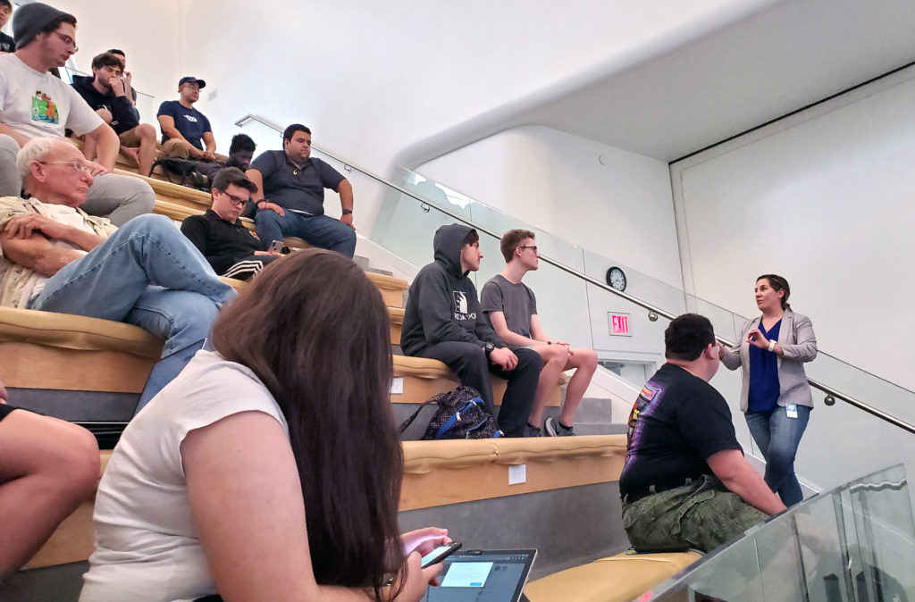 Group of people sitting during a lecture.